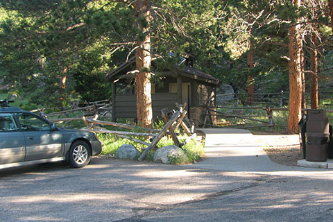 Lawn Lake Trailhead parking and privies.