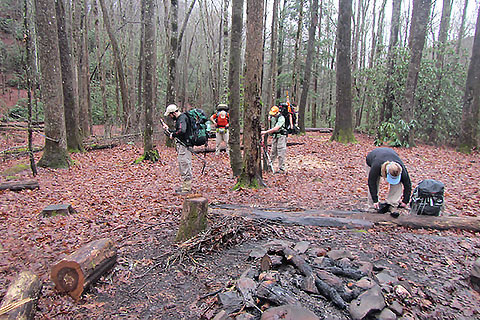 Backpackers preparing to leave Upper Flats camping area